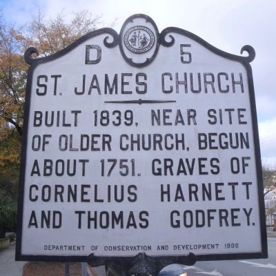 St. James Church historical marker. Reads &quot;Built 1839, near site of older church, begun about 1751. Graves of Cornelius Harnett and Thomas Godfrey.&quot;