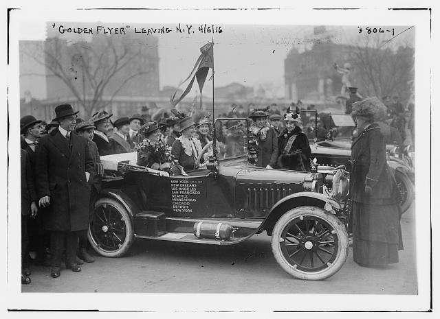 Photograph of Nell Richardson and Alice Burke in their car, getting ready to leave New York in 1916 for a cross-country trip to promote women's suffrage. They called their car the &quot;Golden Flyer.&quot; Image from the collection of the Library of Congress.