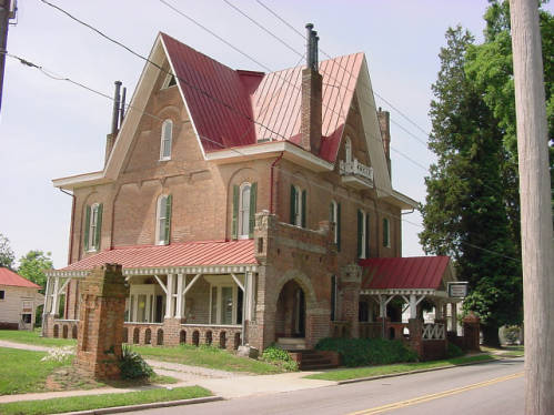 Photograph of &quot;Korners Folly&quot; (pronounced kerners), taken in 2001. Jule Gilmore Korner began construction of the home in 1878 to be a combination of bachelor's quarters, artist studio, office, billiard parlor and ballroom, carriage house and stables, all with a variety of Victorian elements. Image from the NC ECHO project, State Documents Collection, NC Digital Collections.