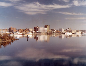 &quot;Wilmington, NC, c.1974, Color Waterfront View of the Business District, view over water.&quot; From Carolina Power and Light (CP&L) Photograph Collection (Ph.C.68), North Carolina State Archives; call #: PhC68_1_77. 