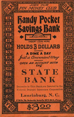 An orange money envelope. Envelope reads &quot;Join our Pin Money club. Handy Pocket Savings Bank. Holds 3 Dollars. A dime a day. Just a Convenient Way. Open An Account with the State Bank. Laurinburg, N.C.&quot;