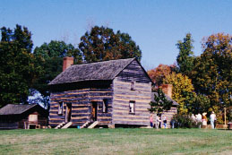 &quot;Reconstructed log cabin similar to one young James K. Polk lived in at the Pres. James K. Polk State Historic Site near Pineville.&quot; Image courtesy of the James Polk NC Historic Site. 