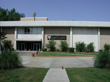 A building wiht a sign for The James E. Cheek Learning Resources Center at Shaw University