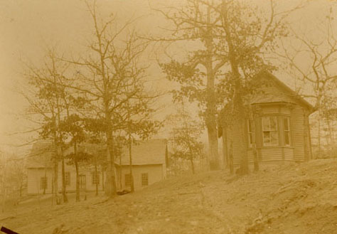 "The first two school buildings of Cullowhee High School, about 1891. The building on the left is the first schoolhouse. On the right is the Music and Art Building." Image courtesy of Western Carolina Library Digital Collections.