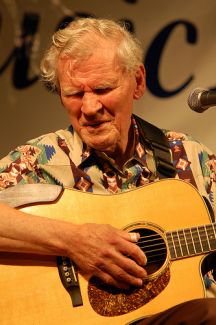 &quot;Doc Watson, 86 years old, plays to the crowd at another fantastic Sugar Grove Music Fest..&quot; Image courtesy of Flickr user Joe Giodorno, taken on July 11, 2009. 