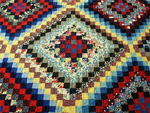 Close-up of &quot;postage stamp&quot; quilt, made by Mamie Dameron, ca. 1935, Gaston County, N.C.  From the collections of the North Carolina Museum of History, used courtesy of the North Carolina Department of Cultural Resources. 