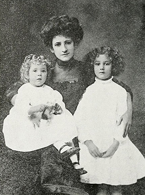 Minna Curtis &quot;Barbara&quot; Bynum, wife of Archibald Henderson, posing with two of her children, circa 1914. Image from the North Carolina Digital Collections.