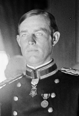 Harris & Ewing. &quot;Medal Of Honor Officers. Gen. Charles F. Humphrey; Gen. John M. Wilson; Col. Charles H. Heyl; Gen. Theodore Schwan; Col. Frederick Fuger; Gen. W.H. Carter; Gen. A.L. Mills; Lt. Gordon Johnston. Picture taken in east room of White House, probably on November 7,  1910 when medal presented to Lt. Johnston for Act of Valor in 1906&quot;. Photograph. 1910 November 7. LC-H261- 1861. Prints and Photographs Division, Library of Congress.