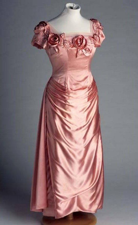 &quot;Dress, Mother of Groom,&quot; pink satin brocade, made by Willie Otey Kay, 1959. Item H.1980.131.1 from the collection of the North Carolina Museum of History. Used courtesy of the North Carolina Department of Natural and Cultural Resources.