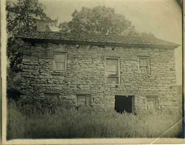 Photograph of Adam Spach's "Rock House" in Forsyth County, built by Adam Spach circa 1774, image taken circa 1900-1920. Item H.1946.14.223 from the collections of the North Carolina Museum of History. William Elias Spach was a descendent of Adam Spach.