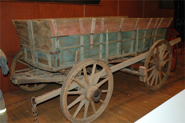 Photograph of farm wagon, attributed to Spach Wagon Works, made circa 1880-1900. Item S.1986.29.1 from North Carolina Historic Sites, North Carolina Department of Cultural Resources.