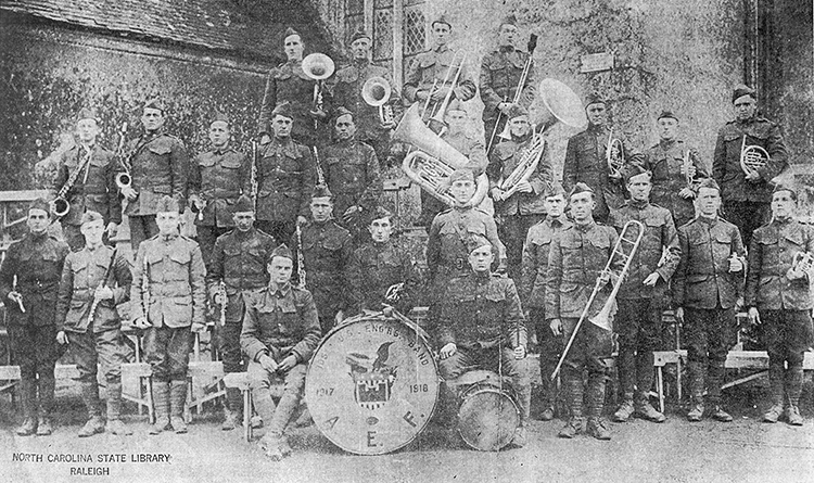 A photograph of the 105th Engineers, 30th Division Regimental Band, Marseilles, France, January 7, 1919. Lamar Stringfield is in the first row at the extreme left. Image courtesy of the Audio Visual Materials Unit, State Archives of North Carolina.