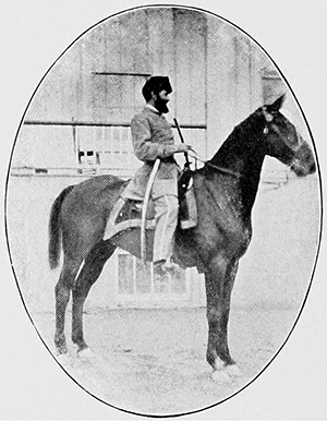 Major John W. Woodfin astride his horse, &quot;Prince Hal,&quot; from Clark's Regimental Histories. Image from Archive.org.