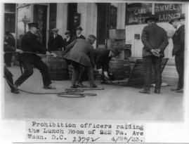&quot;Prohibition Officers Raiding the Lunchroom of 922 Pa. Ave, Wash. D.C.&quot;. 1923. Image courtesy of Library of Congress.