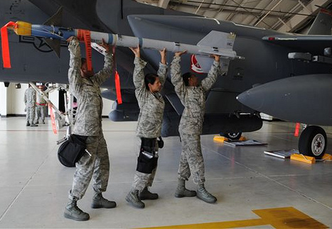 &quot;Crew from the 333rd Aircraft Maintenance Unit attempt to load an AIM-9 Sidewinder missile onto an F-15E Strike Eagle at Seymour Johnson Air Force Base, N.C., Aug. 2, 2012.&quot;
