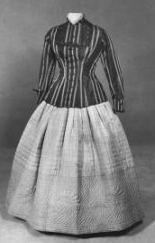 Two piece, brown and beige striped corded taffeta jacket with tortoise shell buttons in floral motif; hand-quilted beige taffeta skirt (petticoat), circa 1865. Available from the North Carolina Museum of History. 