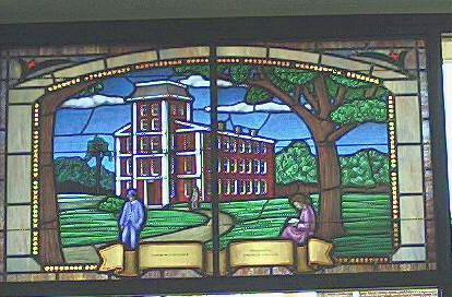 &quot;Stained glass window depicting the surviving Yadkin College building. (Window is at the West Davidson Public Library, Tyro).&quot; Image courtesy of State Archives of North Carolina. 